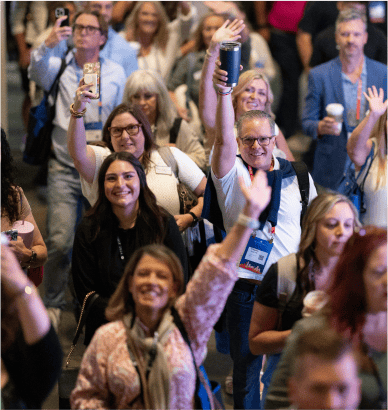 Crowd waving at Success Summit